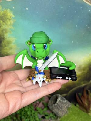 If Link were a dragon 💚 he would play the Nintendo 😄 . Available for adoption this weekend on June 13th at 8amAEST for early access patreon members and at 9amAEST for the public at www.prismaticbrush.com . . . #ocarinaoftime #zelda #zeldafanart #dragon #dragonart 