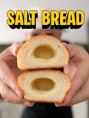Salt Bread Recipe Dough: • 170g bread flour • 48g all-purpose flour (plain flour) • 7g cornstarch • 14g milk powder • 14g sugar • 5g salt • 4g instant dry yeast • 180ml cold water • 16g unsalted butter, softened Filling • 78g salted butter, cold (13g per roll) • Flaky salt for sprinkling • Water for misting METHOD: Mix the flours and 130ml water for 3 minutes. Rest 15 min (autolyse). Add milk powder, sugar, salt, yeast, remaining water. Mix for 3 min. Add softened butter gradually, mix until windowpane test passes. Rest 15-25 min. Bulk ferment 30°C for 2 hours or until doubled. Divide into 6 pieces. Pre-shape into balls, rest 15-20 min. Roll each piece into a long teardrop Place cold butter piece at base. Roll tightly, seal seam. Place seam-down on tray. Final proof for 60 min until puffy. Preheat oven 190°C fan (210°C conventional). Mist rolls with water, sprinkle salt. Spray oven walls to create steam. Bake 15-20 min or until golden.