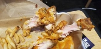 Consumer Food Safety Report Buffalo Wild Wings, Polaris Parkway, Westerville, Ohio, USA My kids were served and ate raw chicken... photo #2