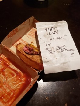 Consumer Food Safety Report McDonald's this burger undercooked (or even cooked at all)? One bite see (pic) and had to throw away... photo #1