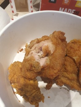 Consumer Food Safety Report KFC, Link Road, Filton, Bristol, UK Eating at your store. Was giving this undercooked chicken. photo #2