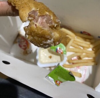 Consumer Food Safety Report Dairy Queen how I Love bitting into some raw chicken !!! ?? photo #2