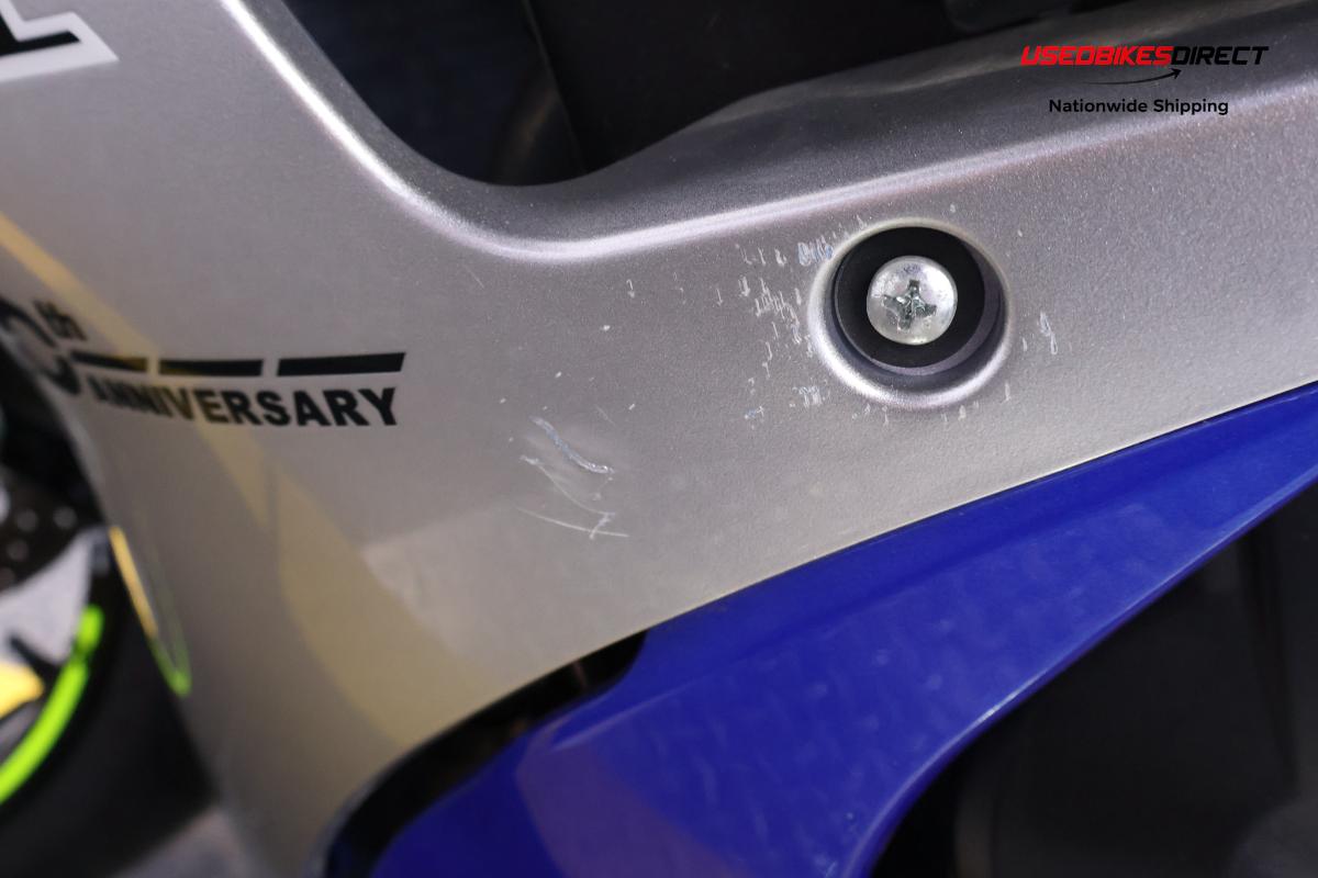 rear seat wear, road rash on side faring and cover, scratches on front wheel faring