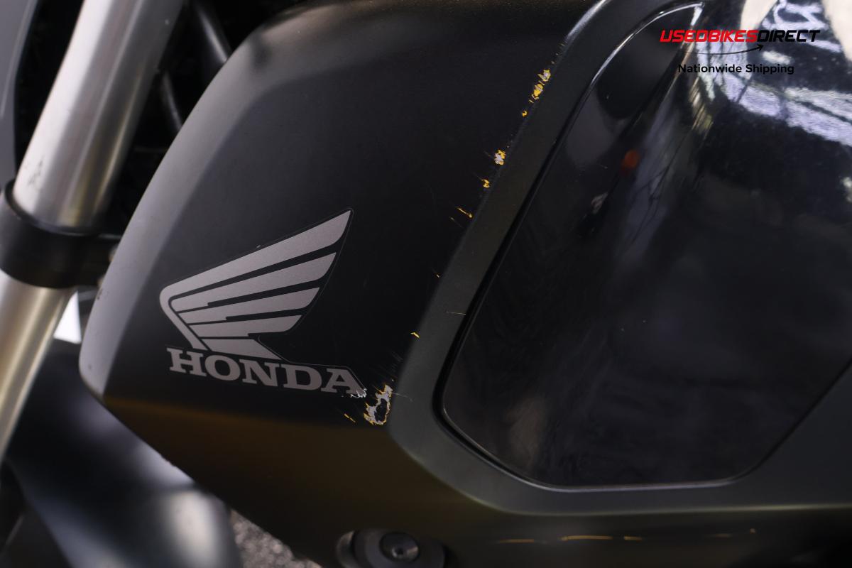 paint scratches and road rash on fender and fairing