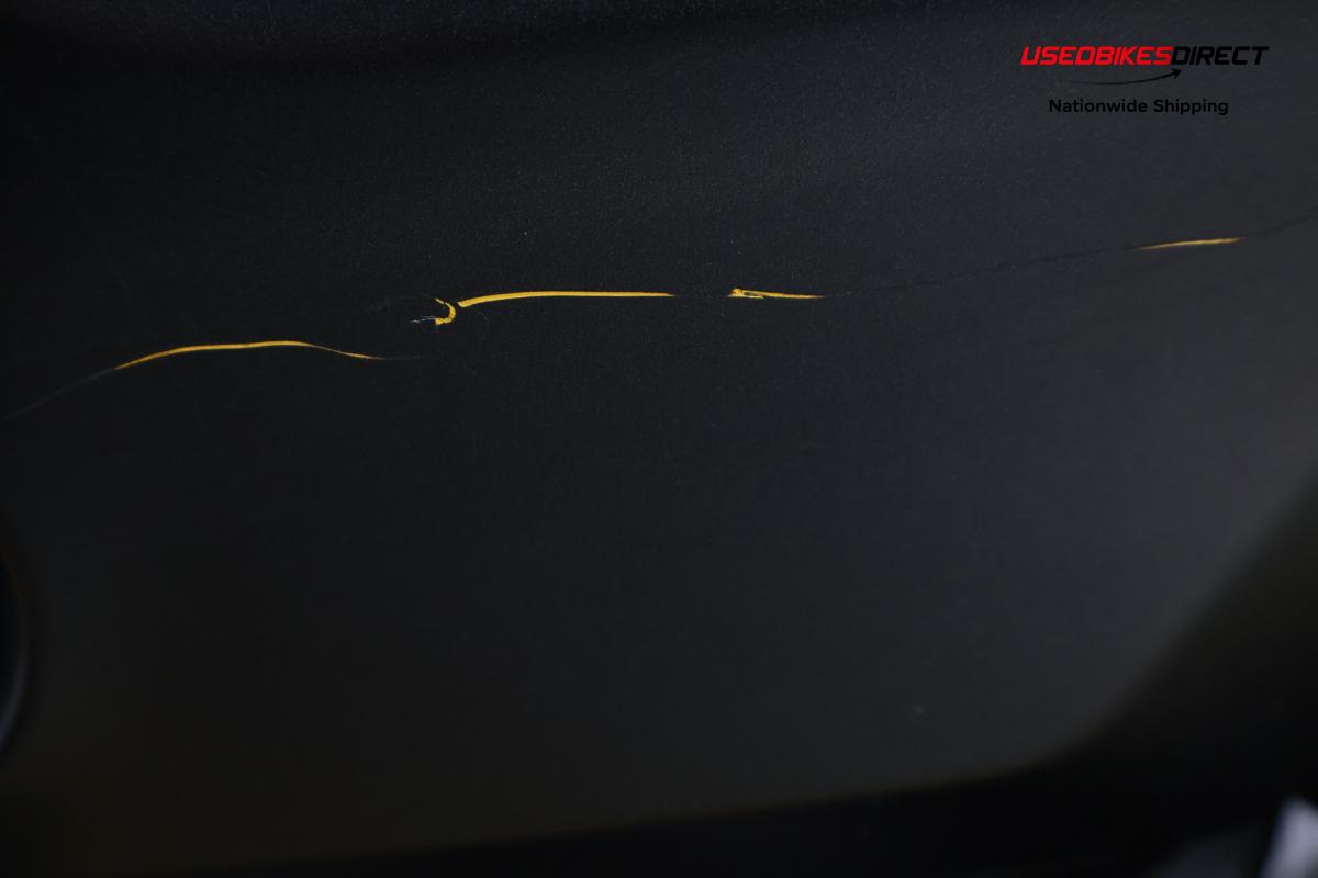 paint scratches and road rash on fender and fairing