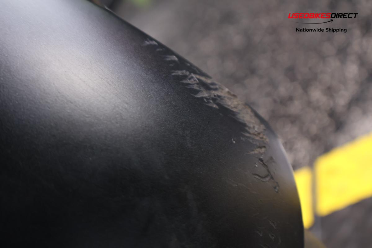 paint scratches and road rash on fender and fairing