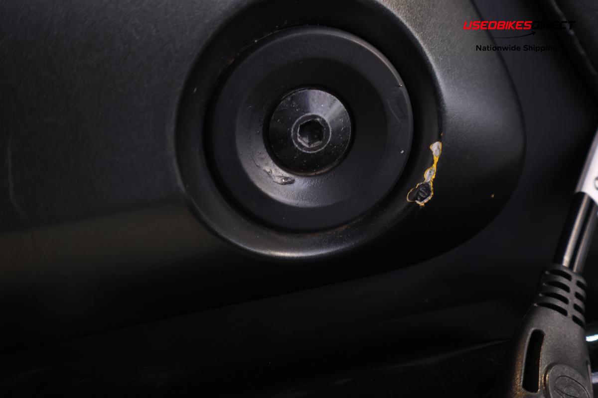 paint scratches and road rash on fender and fairing