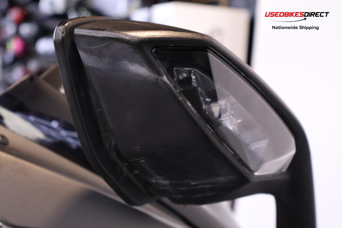 Bent rim on rear, road rash on mirrors and faring
