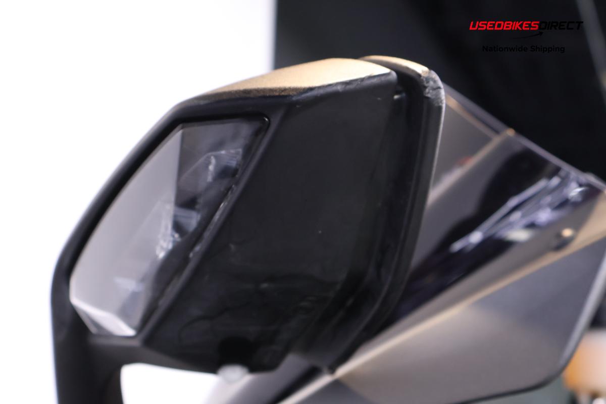 Bent rim on rear, road rash on mirrors and faring
