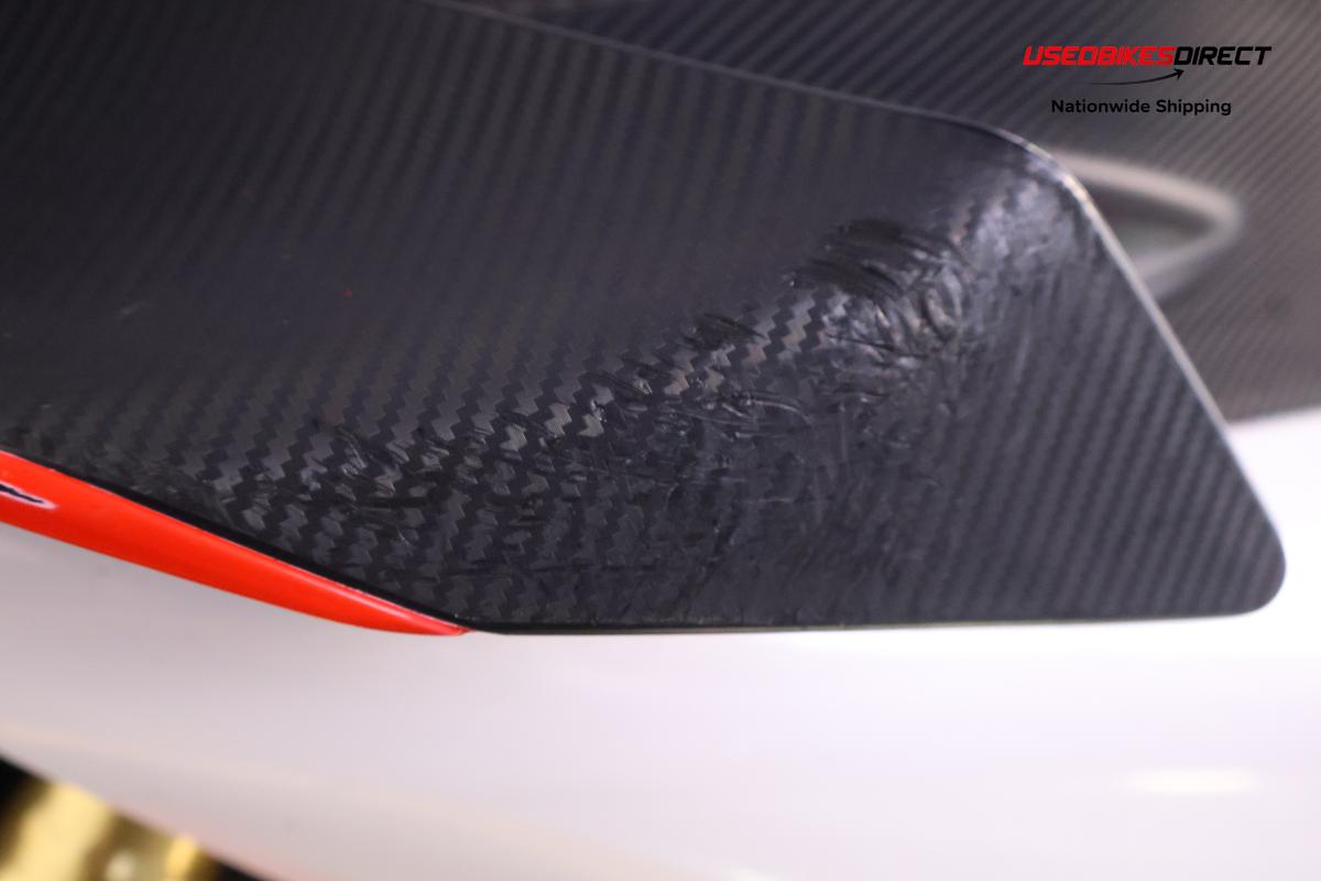 road rash on faring pieces, sliders, levers and front cowl, red paint on faring pieces.