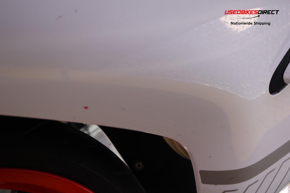 road rash on faring pieces, sliders, levers and front cowl, red paint on faring pieces.