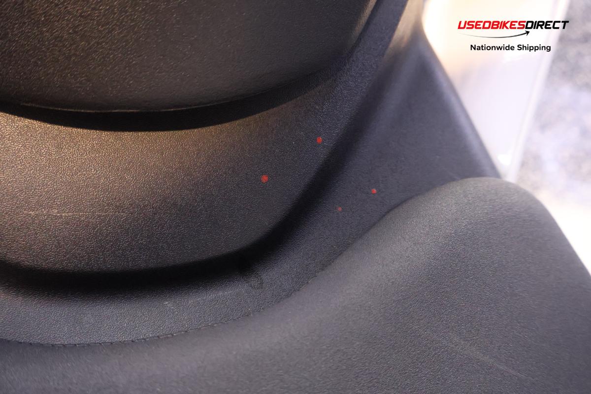 road rash on faring pieces, sliders, levers and front cowl, red paint on faring pieces.
