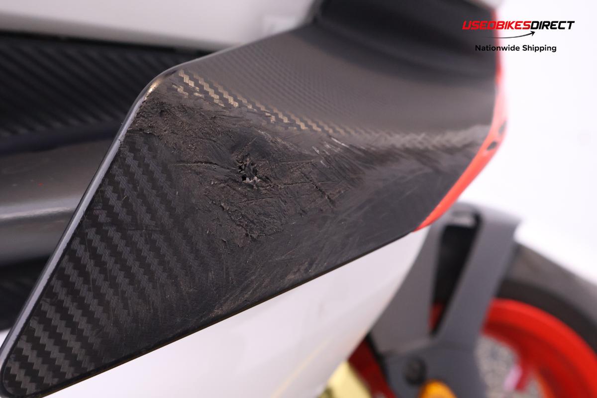 road rash on faring pieces, sliders, levers and front cowl, red paint on faring pieces.