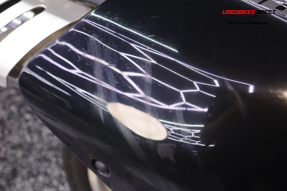 road rash on side mirror, minor scratches on faring.