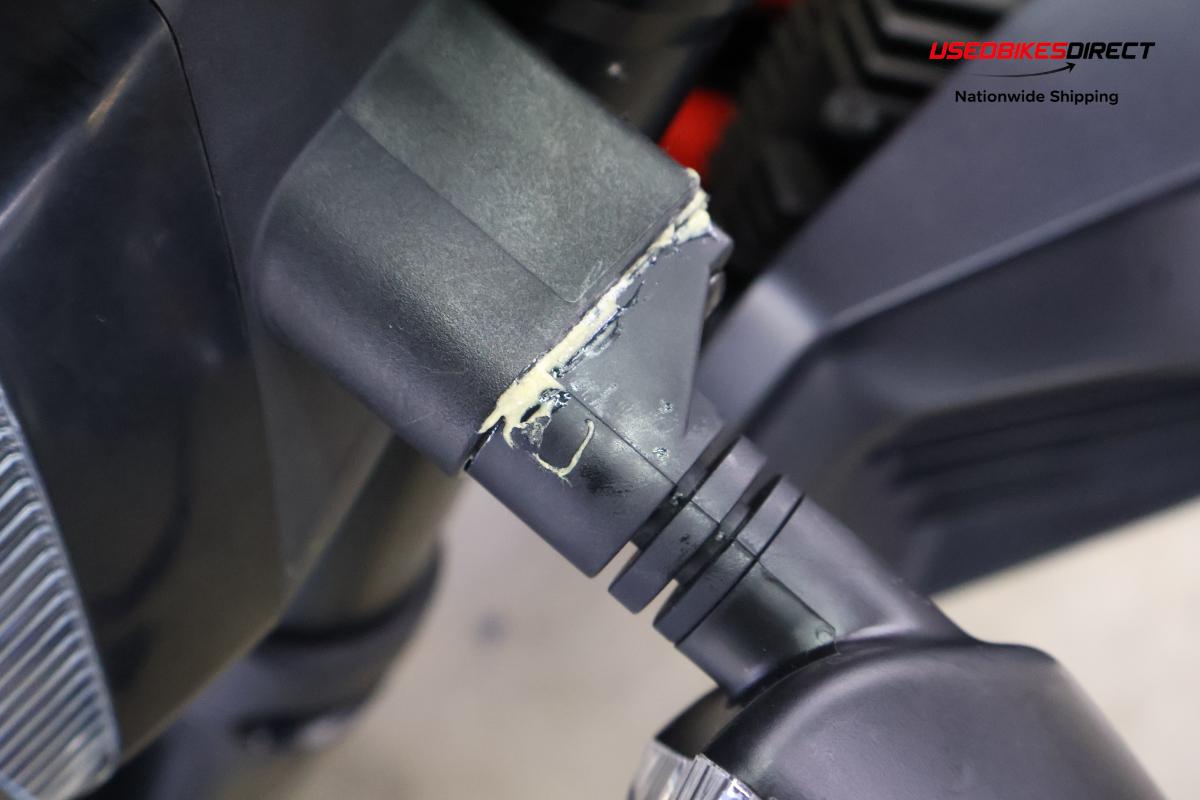 road rash on faring and rear peg, road rash on front guard, glue on turn signal