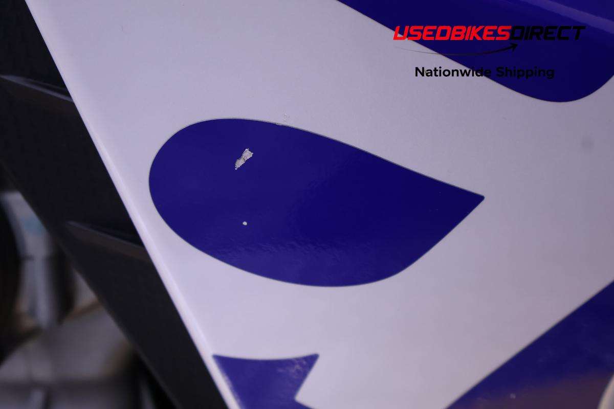 paint chips on faring pieces , road rash on exhaust cover