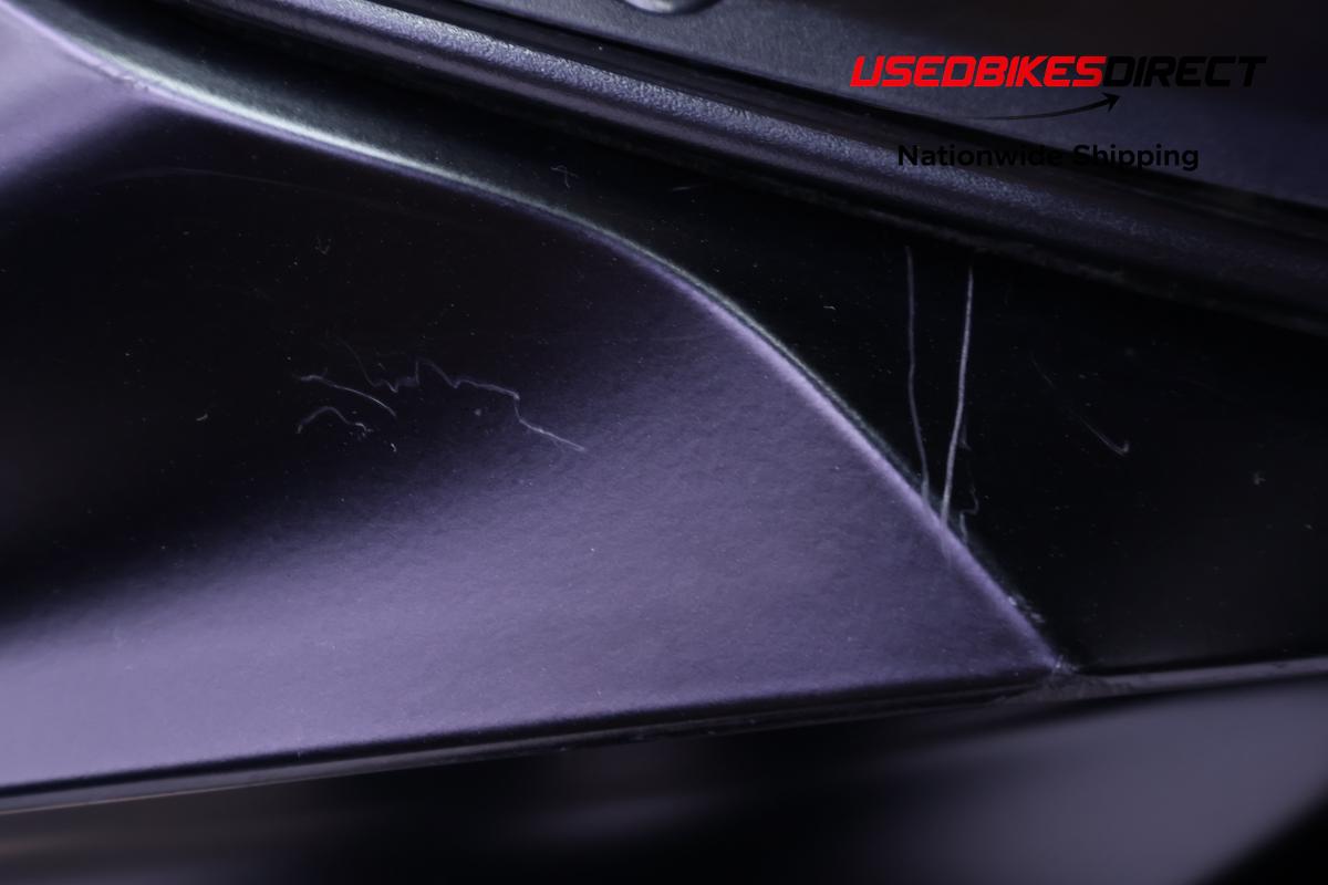 cracked faring piece , road rash and scratches on faring pieces and front fender