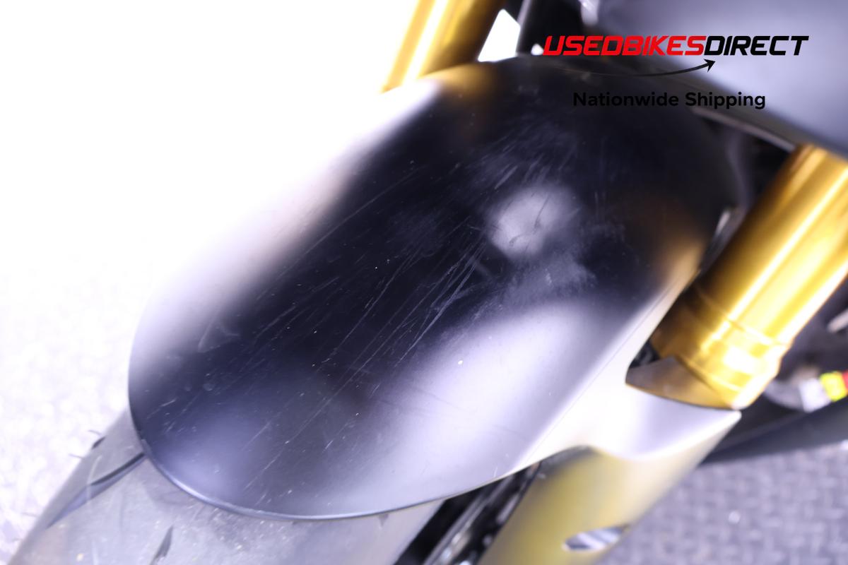 cracked faring piece , road rash and scratches on faring pieces and front fender