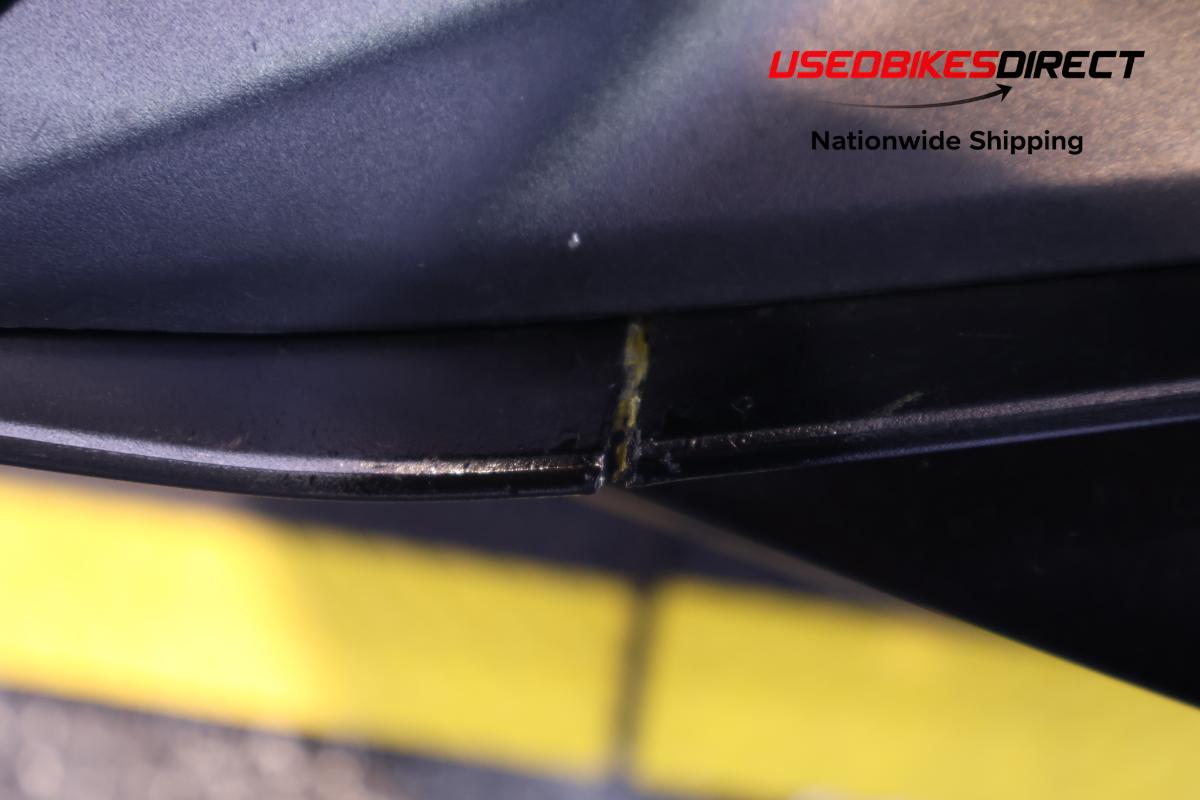 cracked faring piece , road rash and scratches on faring pieces and front fender
