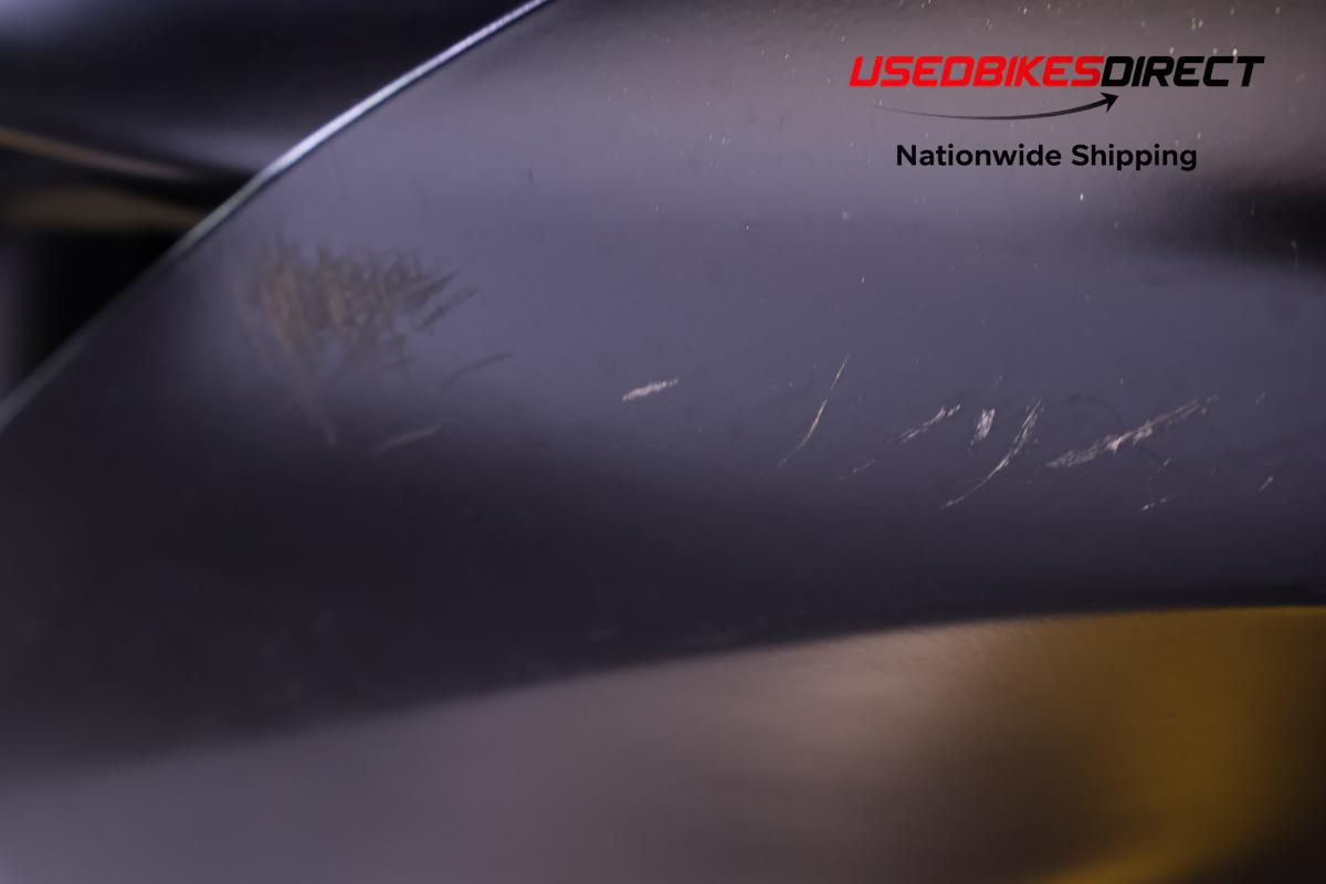 cracked faring piece , road rash and scratches on faring pieces and front fender