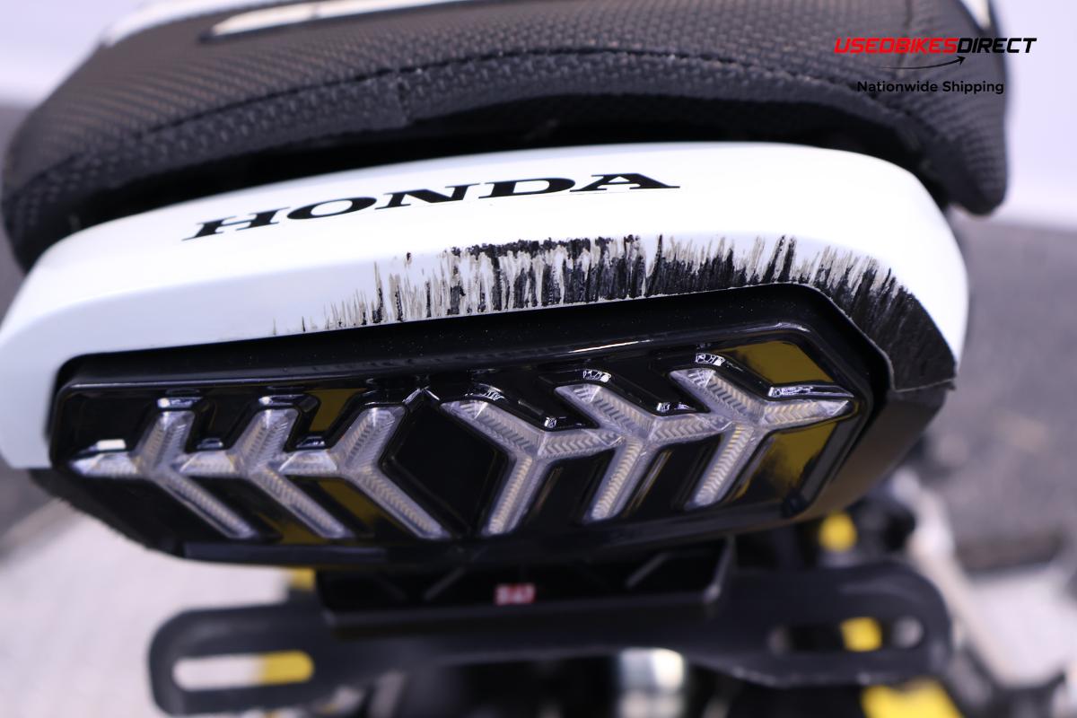 road rash on rear cowl and peg