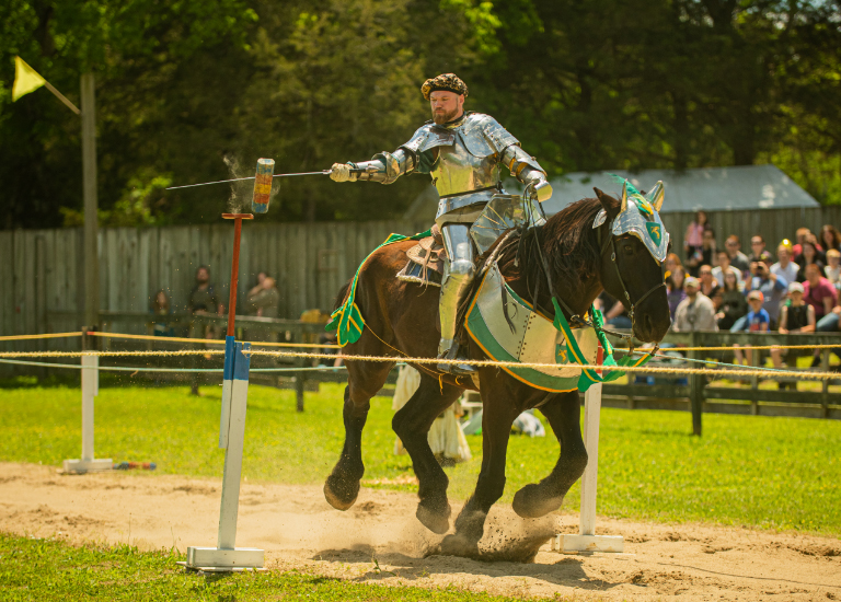 Arrington A knight in full armor jousts on horseback, striking a target with a lance in Williamson County, Tennessee.