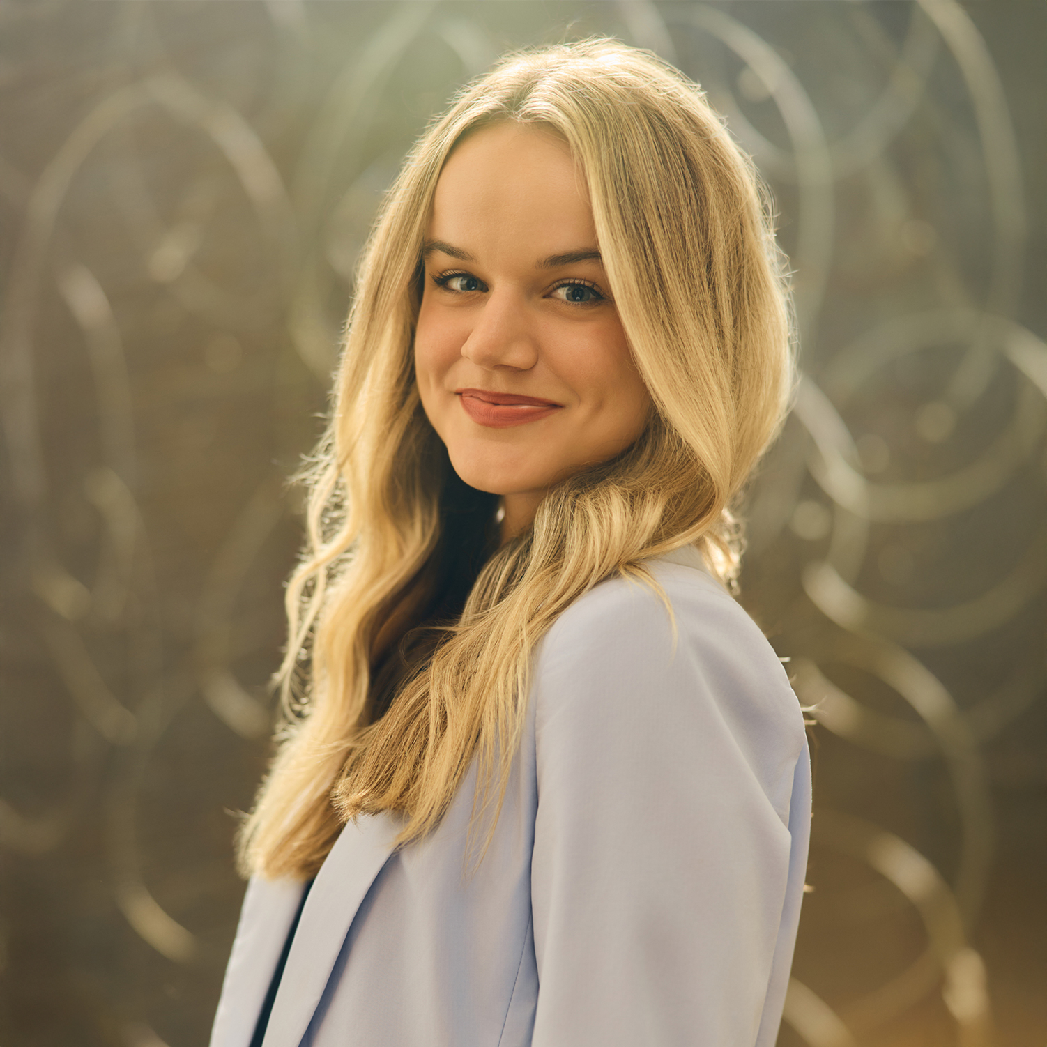 Meet The Team A young woman with long blonde hair smiles warmly at the camera in Williamson County, Tennessee.