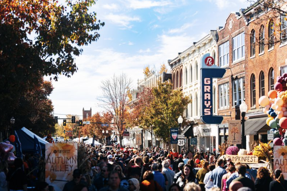 Perfect Pairings for Making the Most of Fall in Franklin Crowded autumn street festival with colorful balloons, pumpkins, and fall decorations in Williamson County, Tennessee.