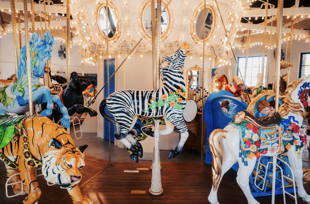 A vibrant carousel featuring a variety of colorful, intricately designed animals and decorative elements in Williamson County, Tennessee.
