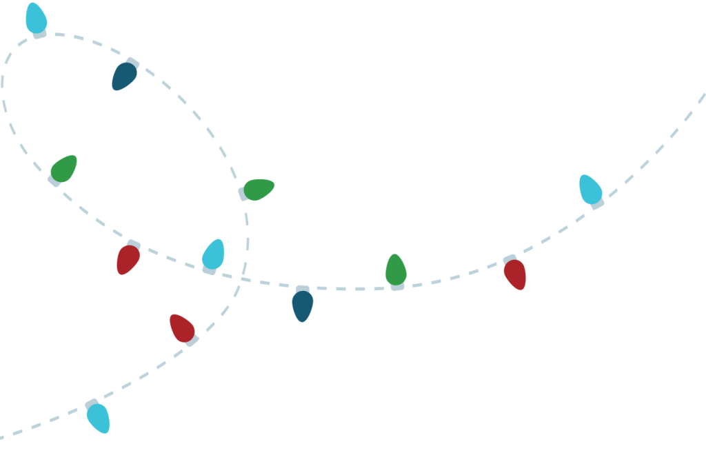 A string of colorful Christmas lights forms a playful, winding pattern against a dark background in Williamson County, Tennessee.