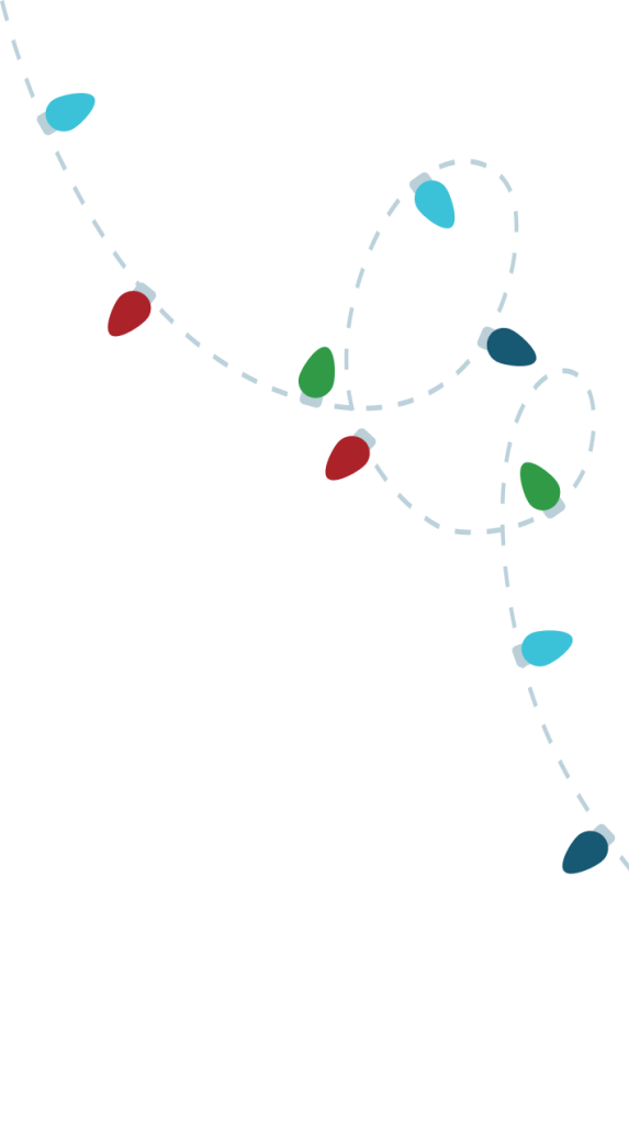 A string of colorful Christmas lights with red, green, blue, and white bulbs, arranged in a playful, looping pattern against a dark background in Williamson County, Tennessee.