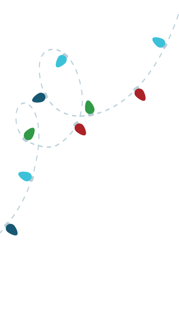 A string of colorful Christmas lights forms a playful, looping pattern against a dark background in Williamson County, Tennessee.