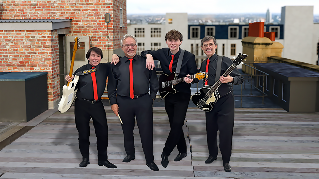 Four musicians dressed in black suits and red ties stand together on a rooftop with a cityscape backdrop, each holding a different musical instrument in Williamson County, Tennessee.