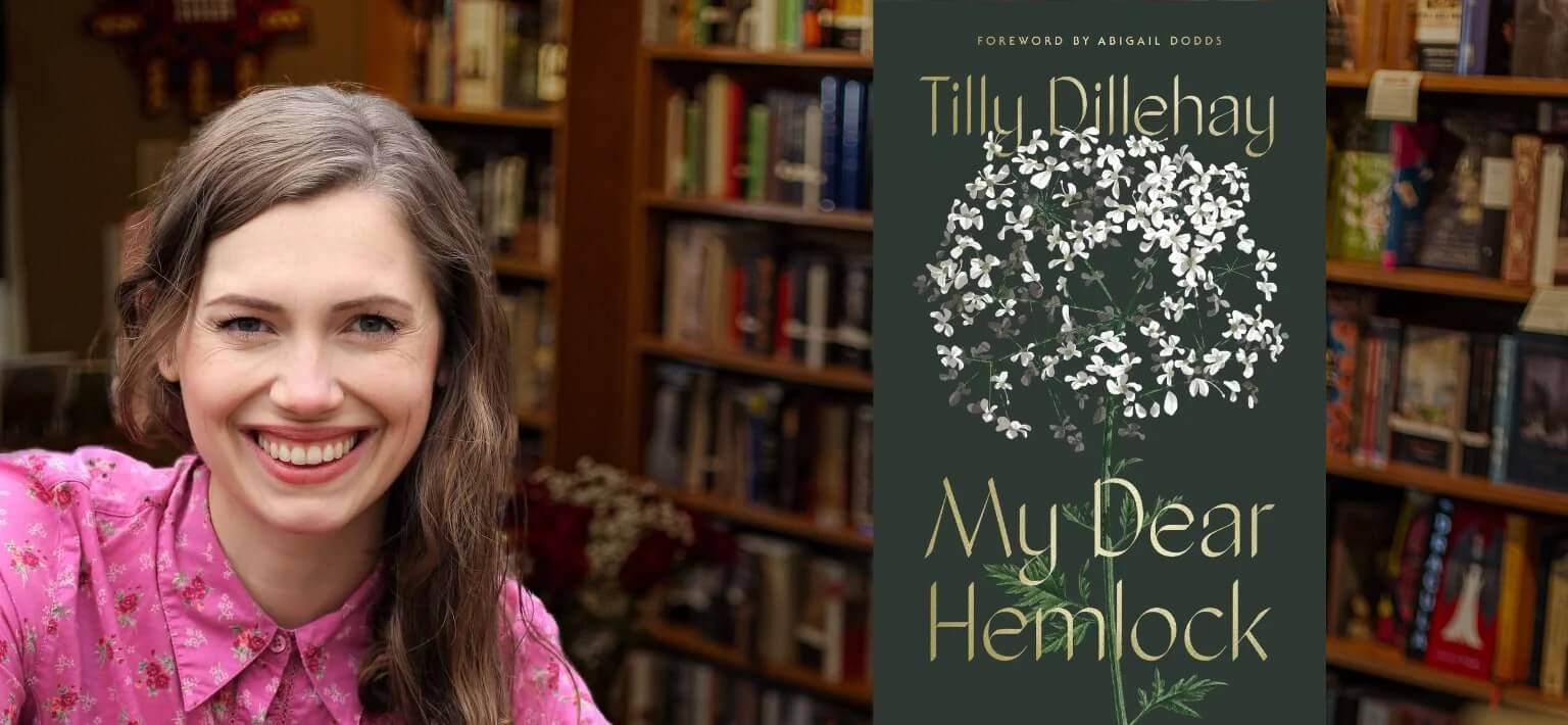 A smiling woman in a pink floral shirt sits in a cozy bookstore surrounded by shelves of books, next to a book cover featuring a white flower in Williamson County, Tennessee.
