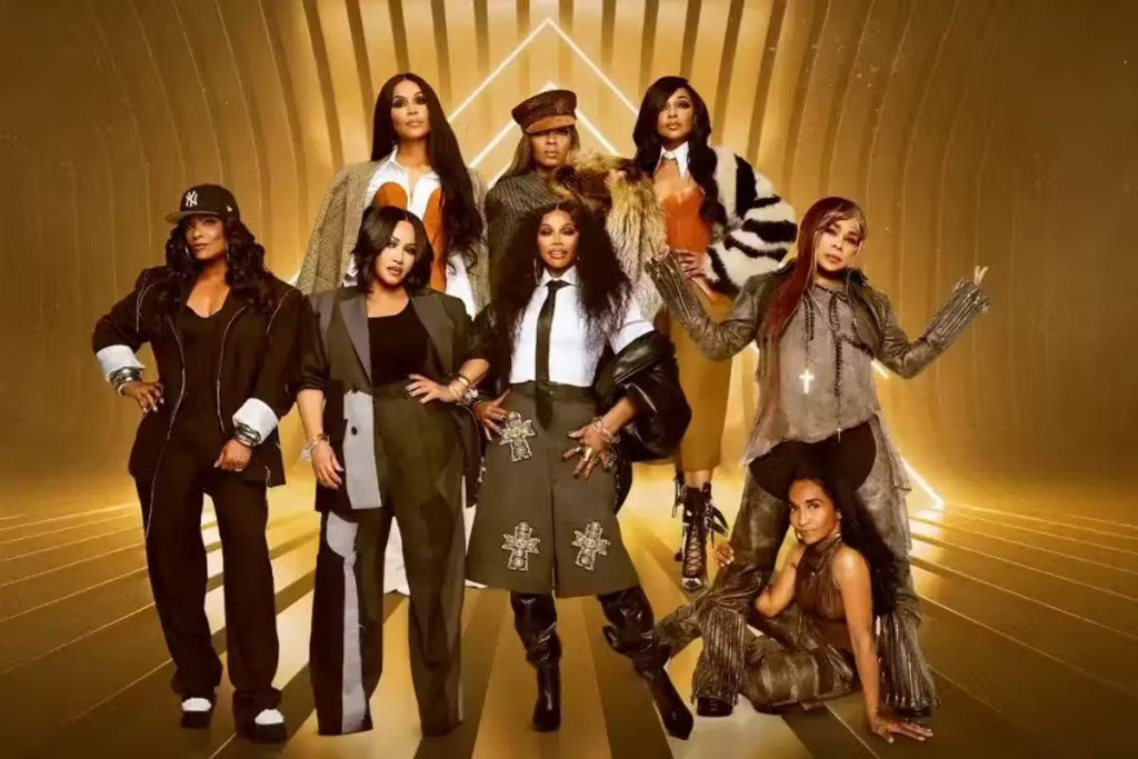 Seven women in stylish, coordinated outfits pose confidently in a golden, geometric hallway in Williamson County, Tennessee.