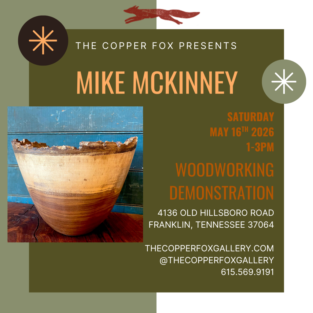 A wooden bowl with a rustic, hand-carved appearance sits on a wooden table, showcasing the craftsmanship of Mike McKinnney in Williamson County, Tennessee.