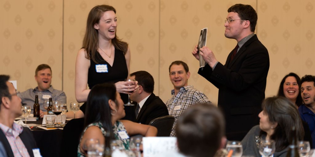 A lively social gathering with guests laughing and enjoying drinks at a formal event in Williamson County, Tennessee.