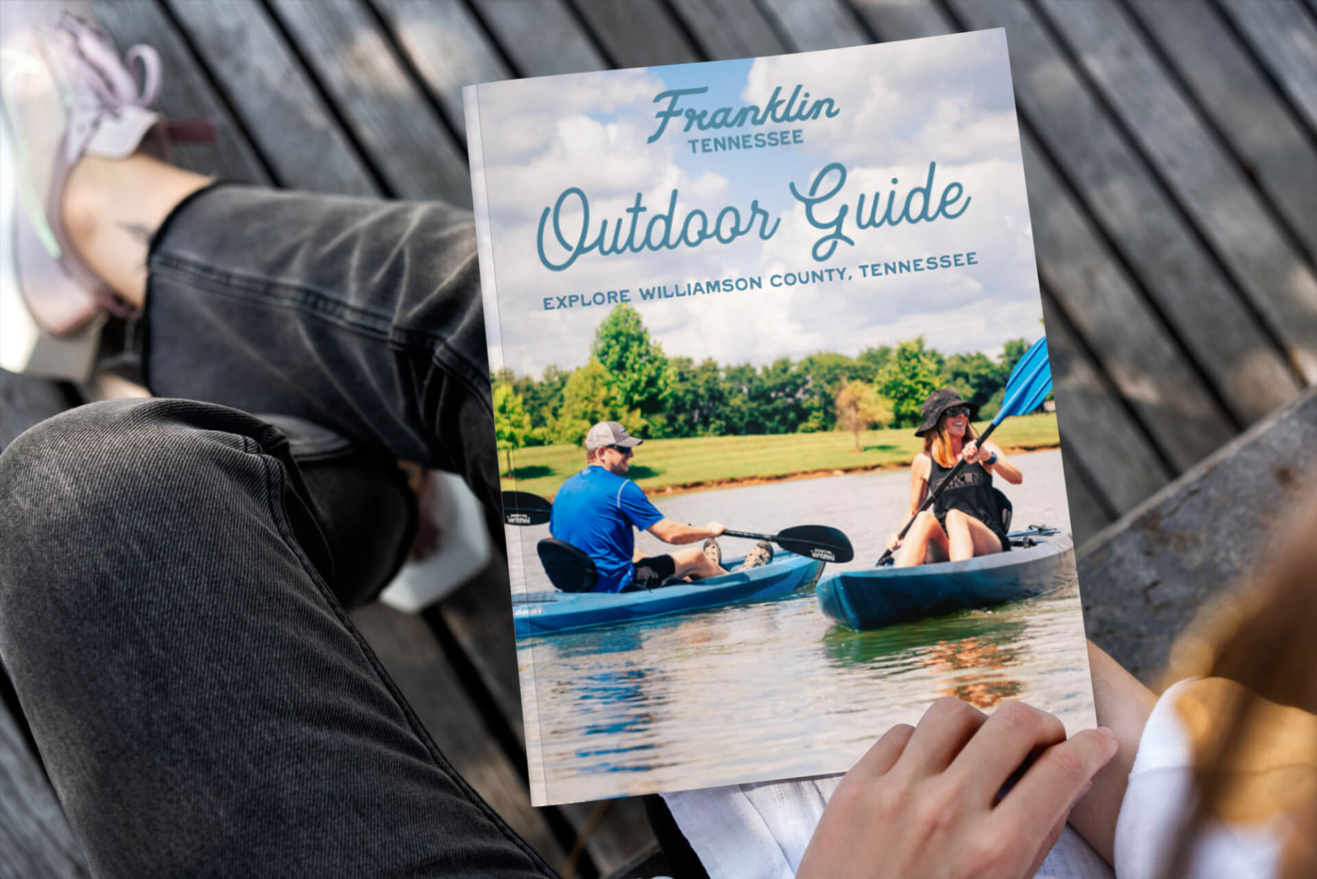 A couple kayaking on a serene lake in Williamson County, Tennessee, as featured in the Franklin Outdoor Guide in Williamson County, Tennessee.