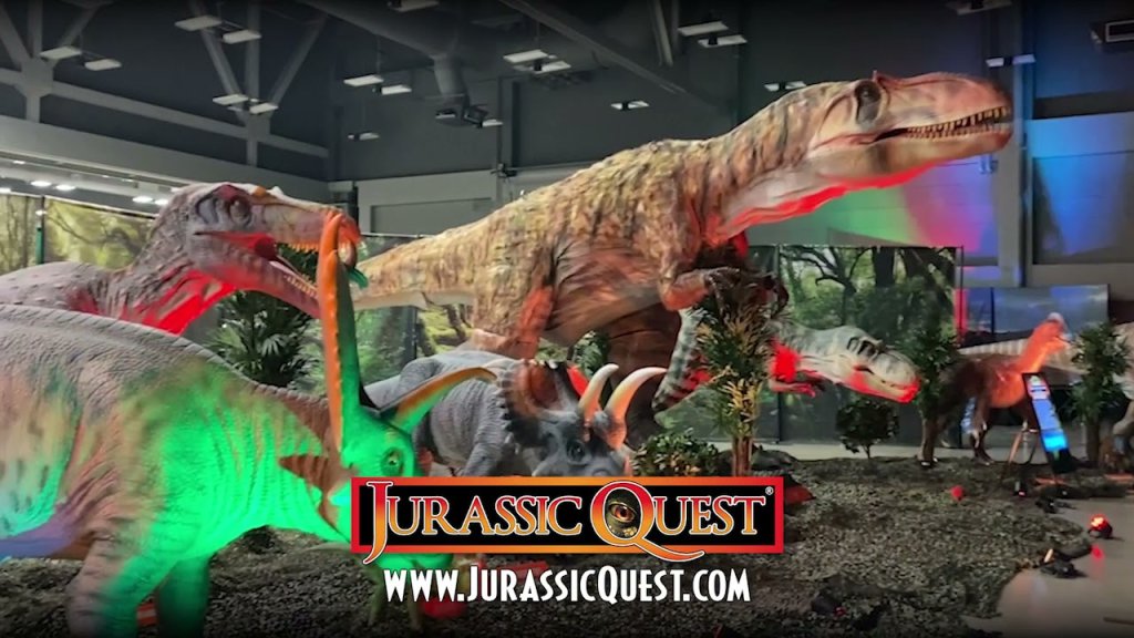 Events A realistic dinosaur exhibit featuring a towering Tyrannosaurus Rex and other prehistoric creatures in a Jurassic Quest display in Williamson County, Tennessee.