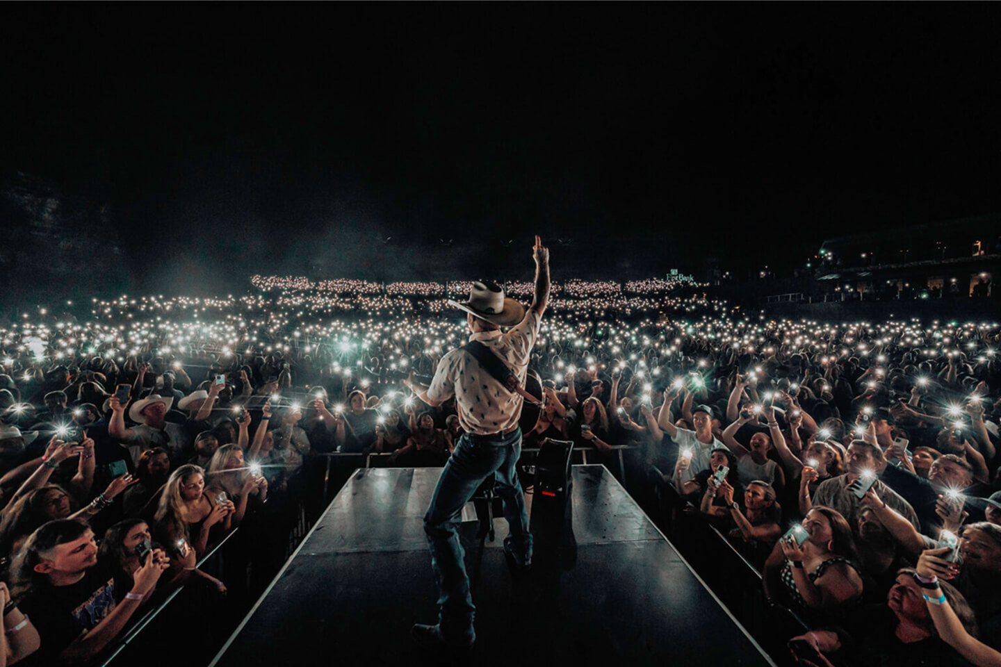 Top 10 Things to Do in Franklin A country singer in a cowboy hat performs on stage before a lit crowd in Williamson County, Tennessee.