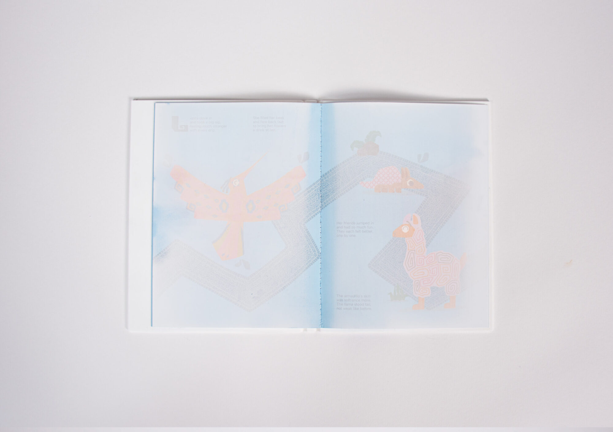 Pages of "The Thirsty hummingbird" book semi-dehydrated. The content is not 100% visible.