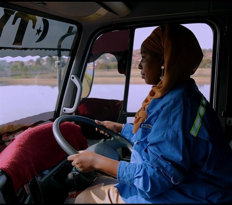 Juliet, a private sanitation service provider, drives the truck for FSM transport. 