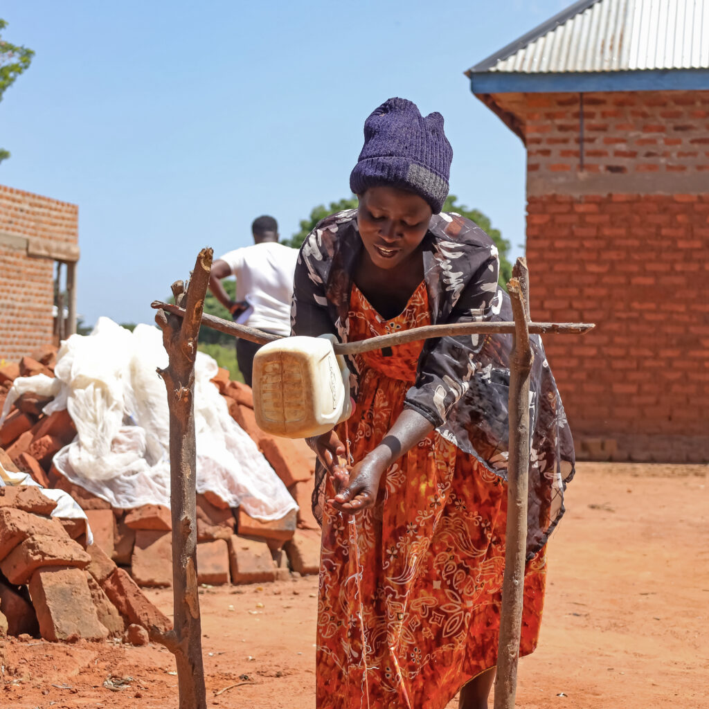A women washes her hands