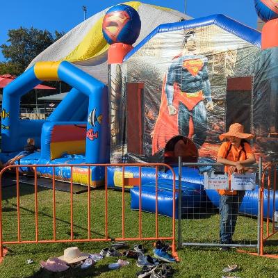 Professionally Supervised and fenced jumping castle and slide combo for events
