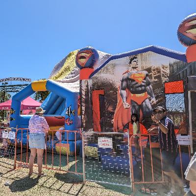 Professionally Supervised and fenced jumping castle and slide combo for events thumbnail 3