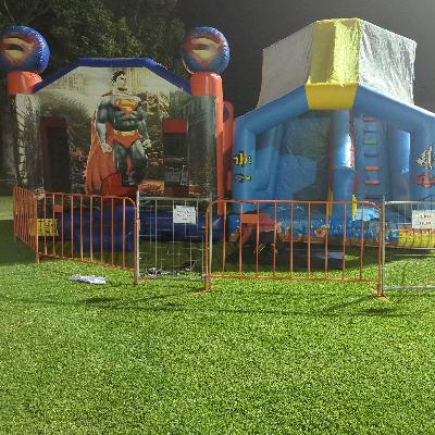 Professionally Supervised and fenced jumping castle and slide combo for events thumbnail 2