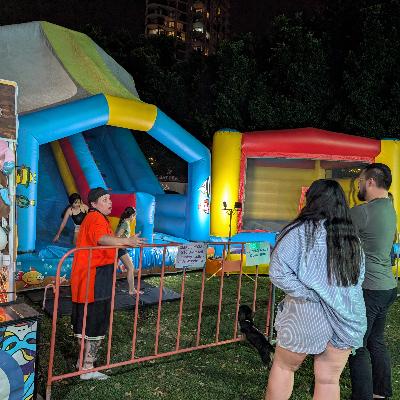 Professionally Supervised and fenced jumping castle and slide combo for events thumbnail 4
