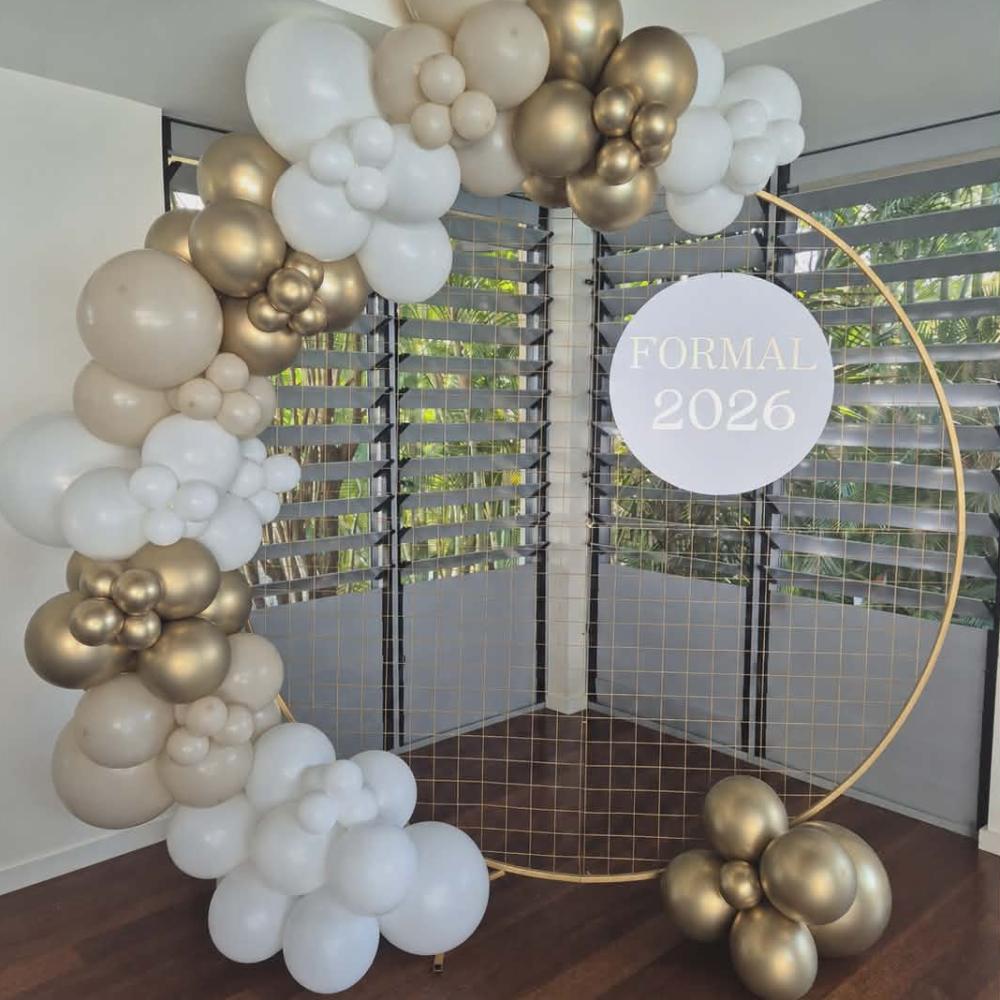 Gold Arch with Balloon Garland and Sign