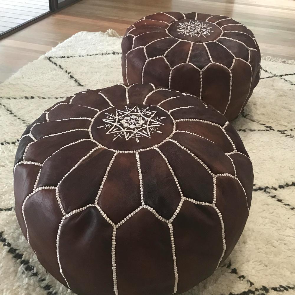 Brown leather pouffe