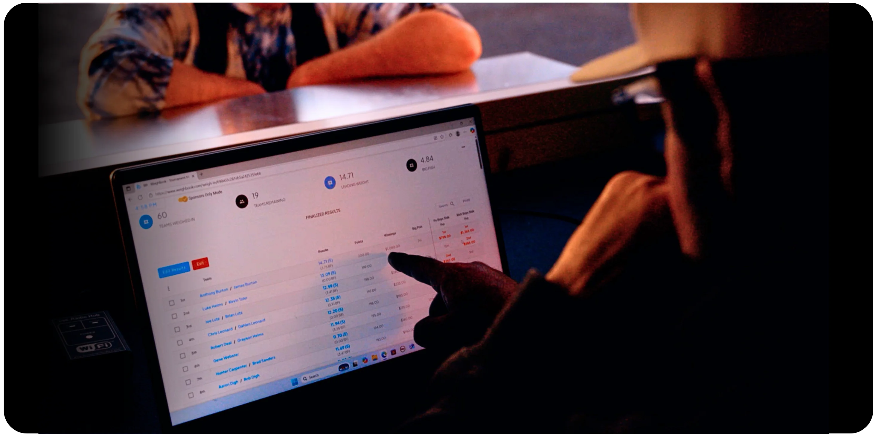 WeighBook tournament software being used on a laptop
